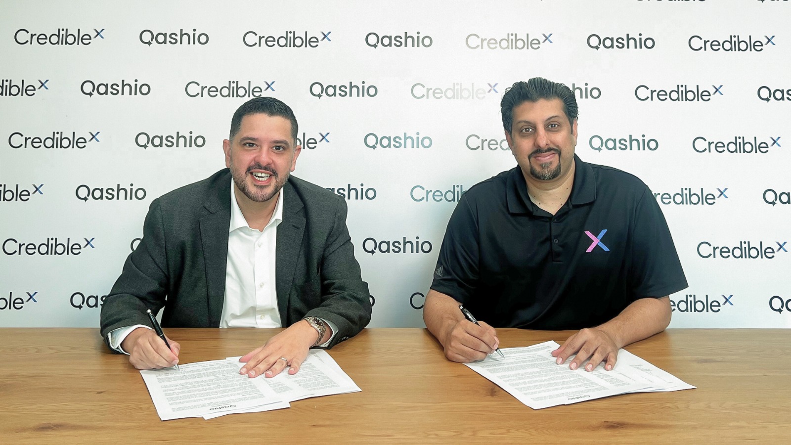 Image - Image - Armin Moradi, Co-Founder and CEO of Qashio and Ahmad Malik, Co-Founder of CredibleX signing the partnership agreement.