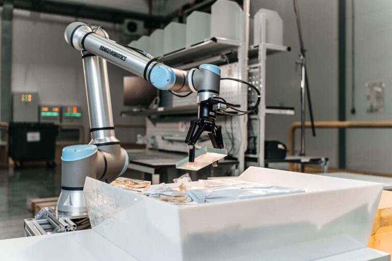 Image 1 - Yango Tech’s robotic arm streamlining industrial processes through cutting-edge automation.