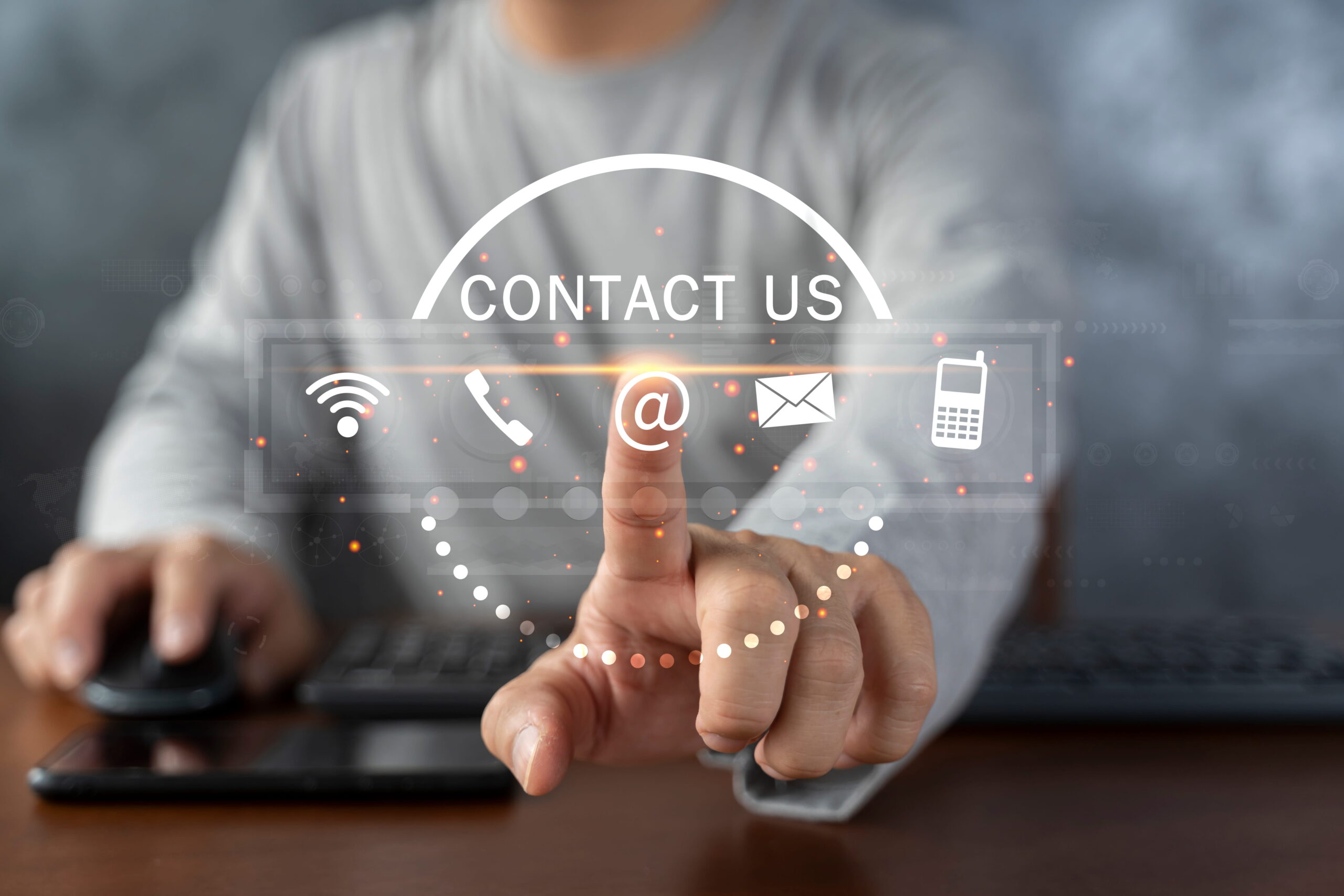 contact-us-customer-support-hotline-people-connect-businessman-using-laptop-touching-virtual-screen-contact-icons (1)