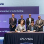 WeTell x British Council - MOHE Signing - Jane Baker from Pearson signs the MoU alongside Dr Ayman Farid