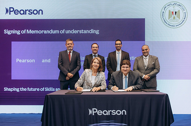 WeTell x British Council - MOHE Signing - Jane Baker from Pearson signs the MoU alongside Dr Ayman Farid